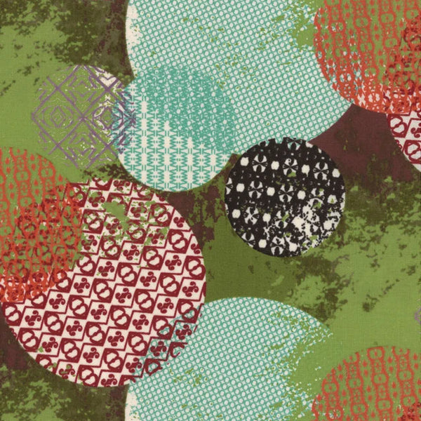 Patterned circles in red, green, and black on a textured background
