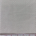 Fabric with a subtle pattern on a white background