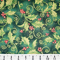 Christmas-themed fabric with holly leaves and berries on a green background